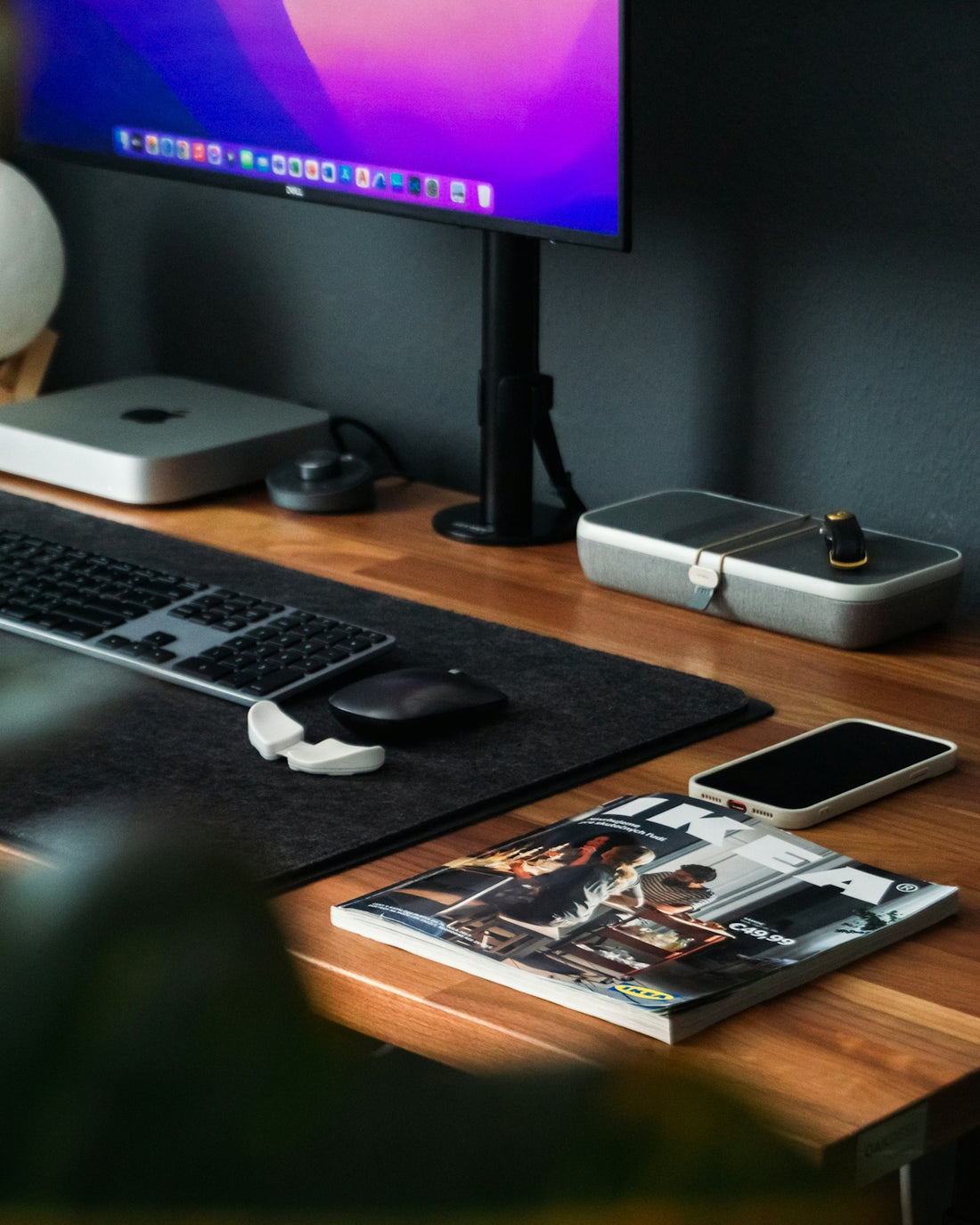 a desk with a computer and a keyboard