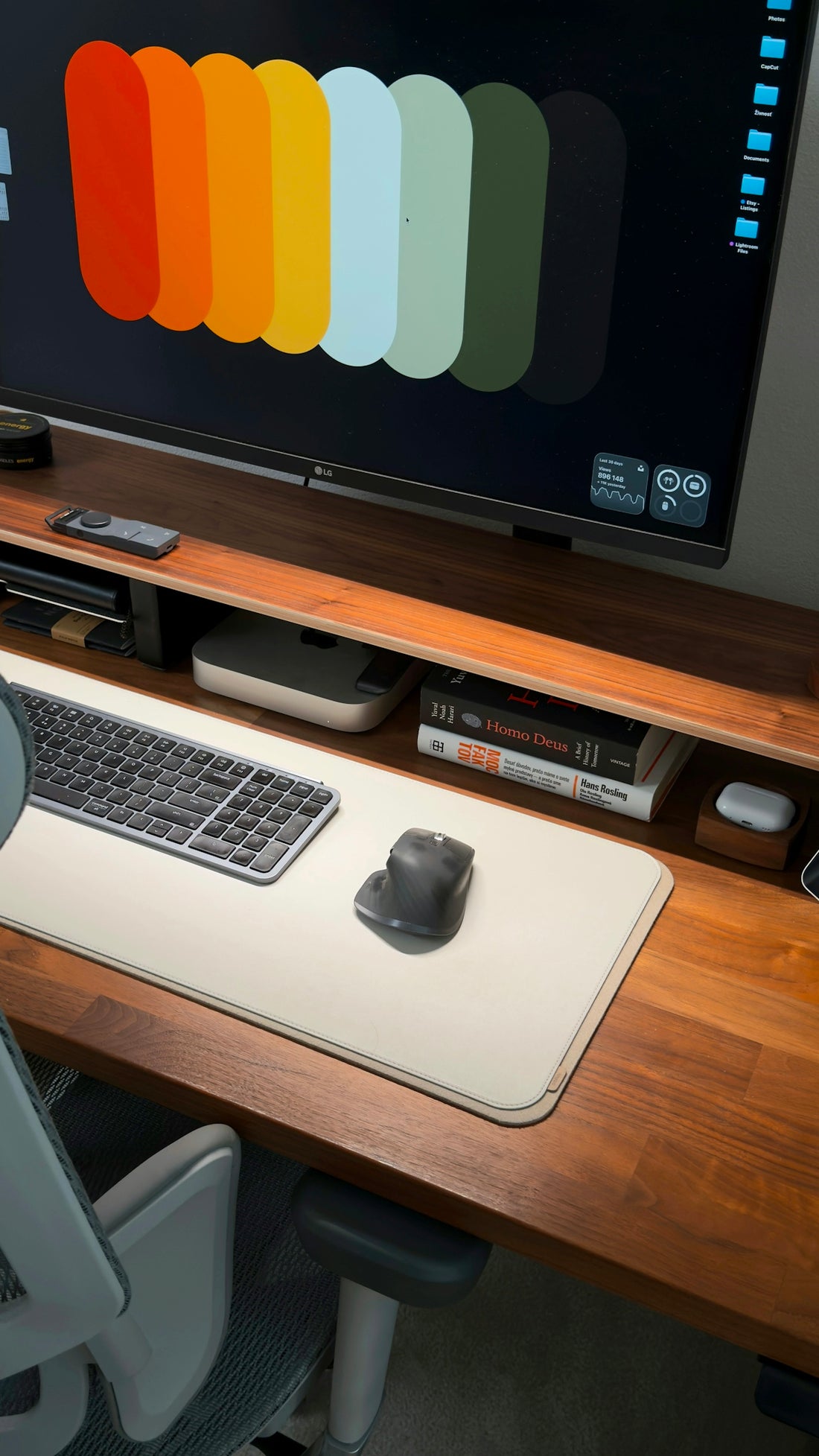 A modern desk setup with a computer and accessories.