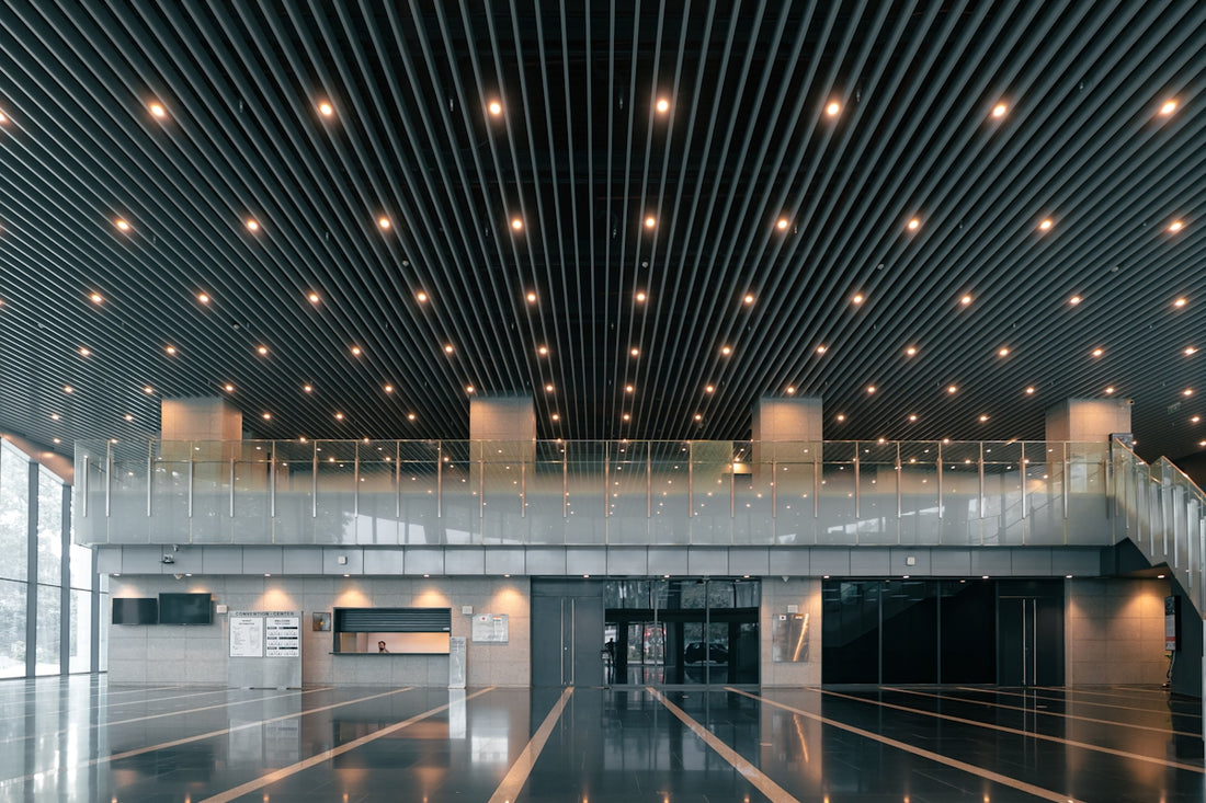 Modern interior with reflective floors and ceiling lights