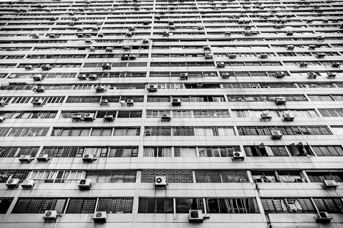 Many air conditioning units on a building facade
