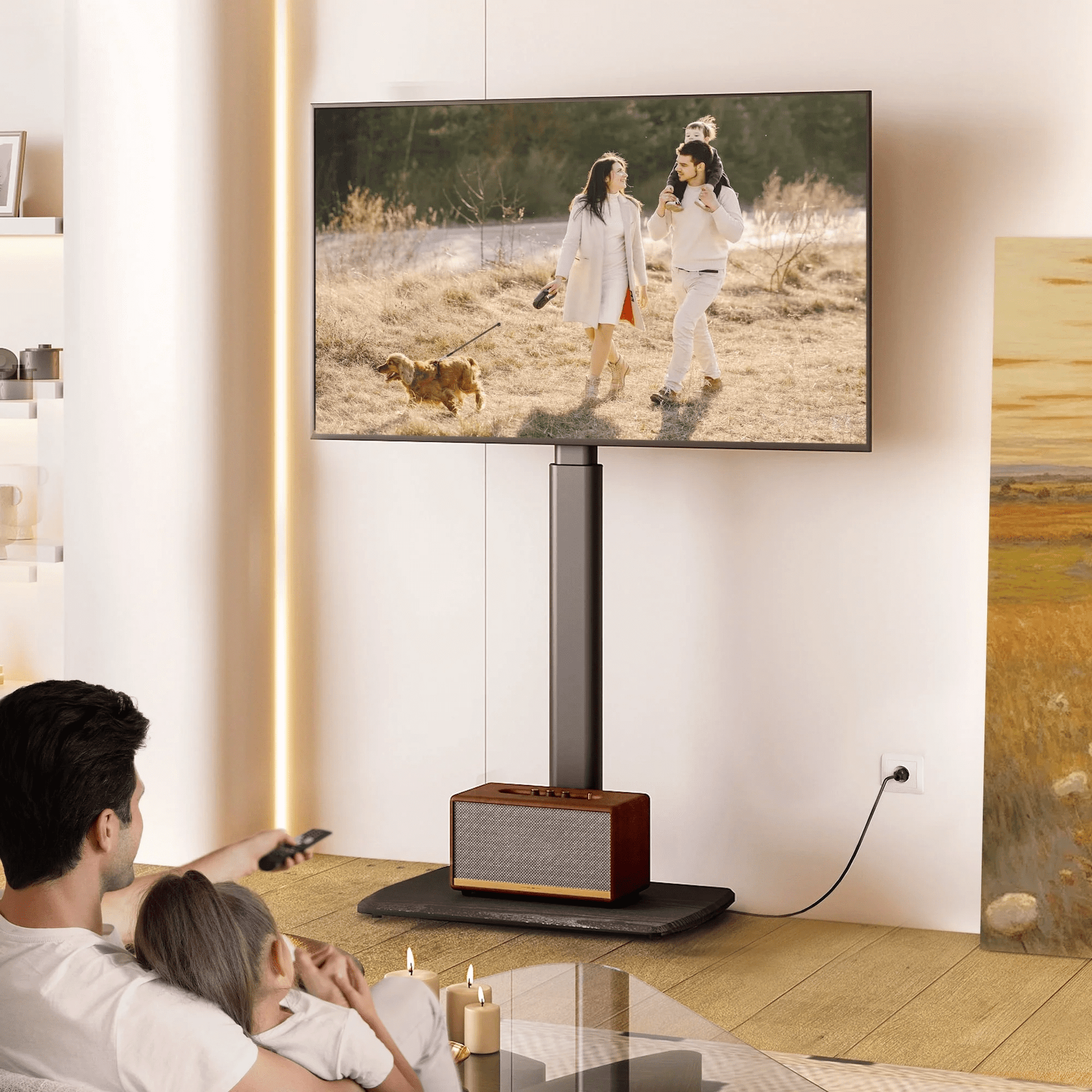 FITUEYES Modern Black Swivel Floor TV Stand for TVs up to 70 inch Metal Base with Power Strip Mount